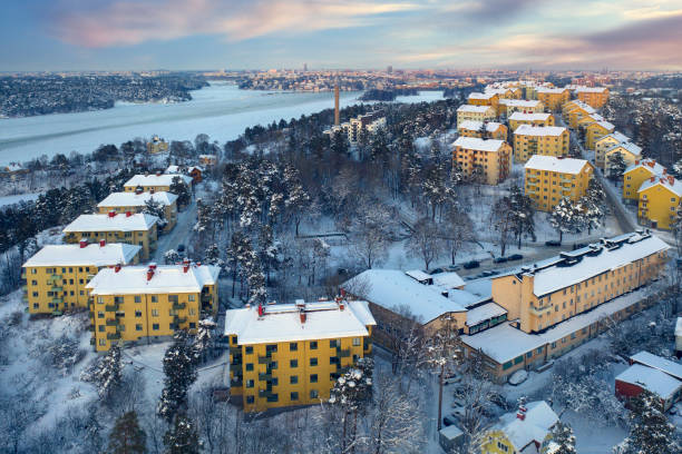 Hägersten in Stockholm View over apartment buildings on Klubbacken in Hägersten outside Stockholm on a winter day. lake malaren photos stock pictures, royalty-free photos & images