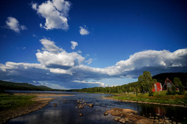 clouds over lake, in Norway Scandinavia North Europe