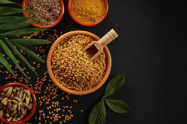 Fenugreek  is an annual plant in the family Fabaceae, is cultivated worldwide as a semiarid crop and its seeds and leaves are common ingredients in dishes from the Indian subcontinent where it is called methi. On a slate platter