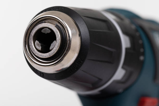istock close-up electric drill without drill on an isolated white background 1303673204
