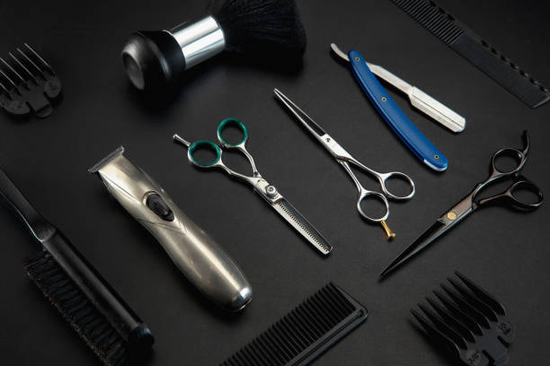 istock Barber shop equipment set isolated on black table background. 1303673265