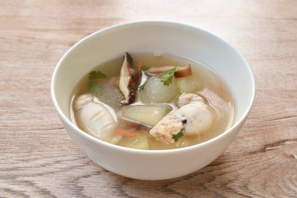istock boiled winter melon with squid stuffed mashed pork soup in bowl 1303675079