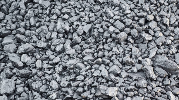 istock Natural black coal for background, close up 1303678500