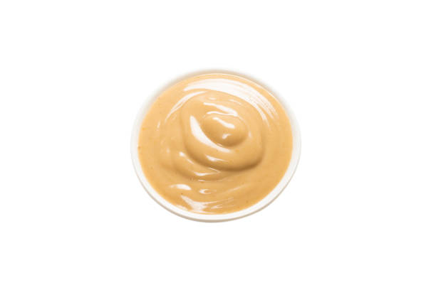 istock Mushroom sauce in a bowl isolated on white background. 1303679323