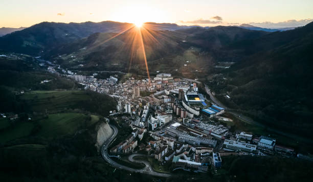 Rpas flight over the town of Eibar during sunrise.