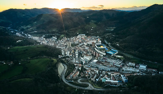 Rpas flight over the town of Eibar during sunrise.