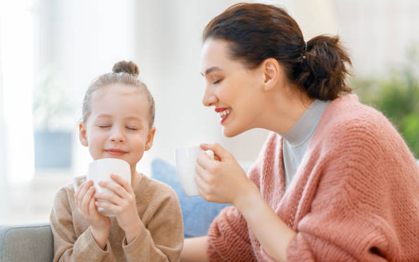 istock Mom and her daughter smiling and hugging 1303682920