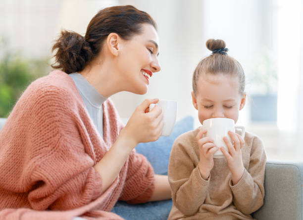 istock Mom and her daughter smiling and hugging 1303682956