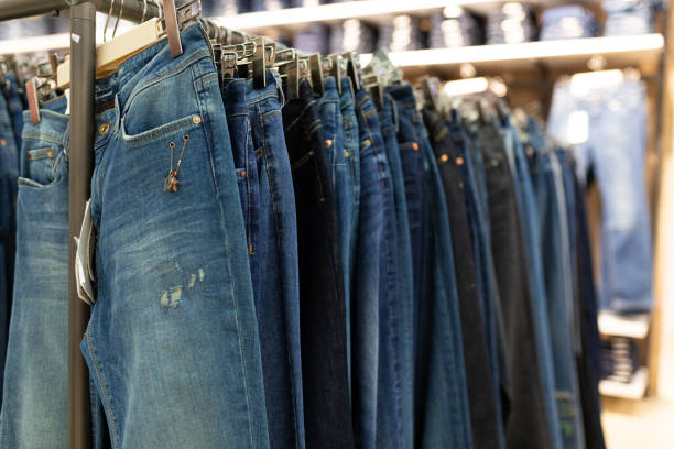 istock pants store of different colors and sizes 1303683033