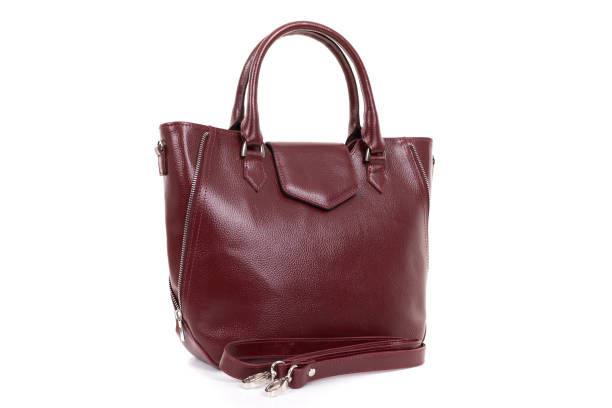 istock stylish ladies leather bag on a white background 1303684309
