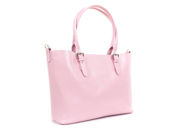 istock pink elegant ladies expensive leather bag close up 1303684316