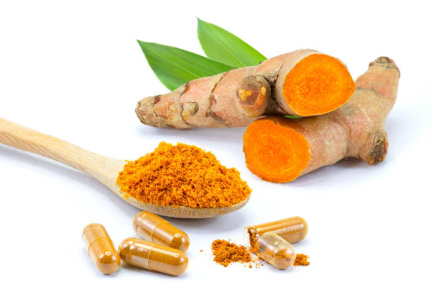 istock Turmeric herbal powder capsules 1303686601