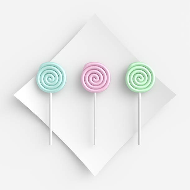 istock Colored candy on stick with minimal white background, top view 1303686687