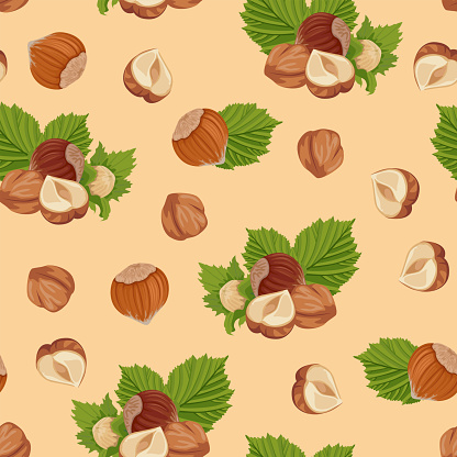 Seamless pattern with hazelnuts. Organic food background. Vector illustration of whole nuts, halves and green leaves in cartoon flat style.