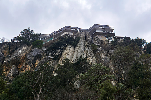 modern architecture - townhouses are built over a cliff and fit into the landscape