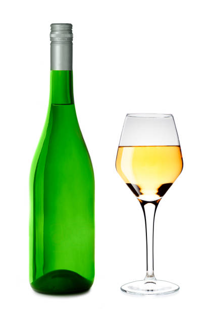 istock White wine glass and bottle 1303695348