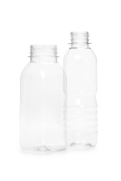 istock two empty new plastic bottle isolated on white background. production of containers 1303695392