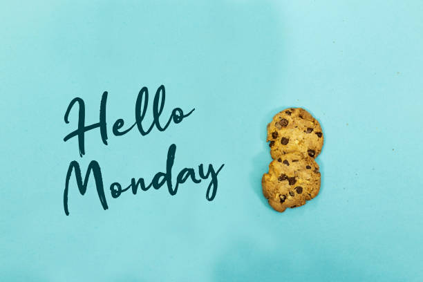 istock chocolate cookies and hello monday isolated on blue background 1303698624