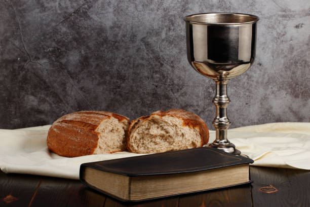 istock holy communion chalice with wine and bread 1303699823