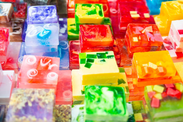 istock Craft natural cosmetic. A group of multicolored handmade soap. Top view 1303701019