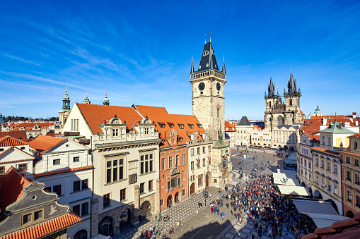 Prague, Czech Republic - March 2, 2020 Large crowd of people gathered to watch the astronomical clock.