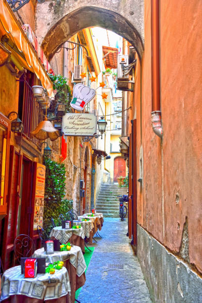 Sorrento Campania Italy typical restaurants with outdoor tables in the alleys of the historic center September 30 2018 Sorrento Italy amalfi food stock pictures, royalty-free photos & images