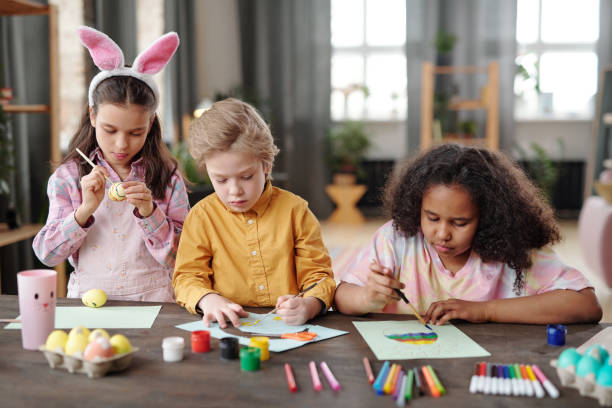 istock Children painting at art class 1303704612