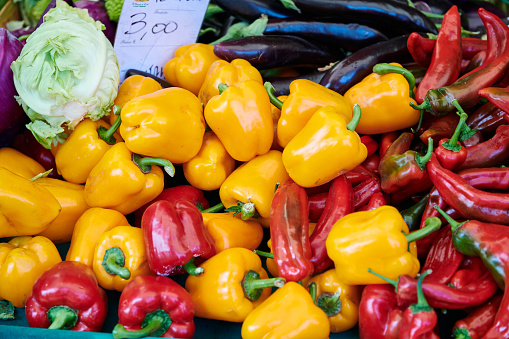 Beautiful and colourful bell pepper on the market stall in Siena, Italy