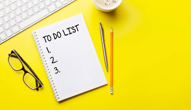 istock Office desk with supplies, coffee and notepad 1303708444