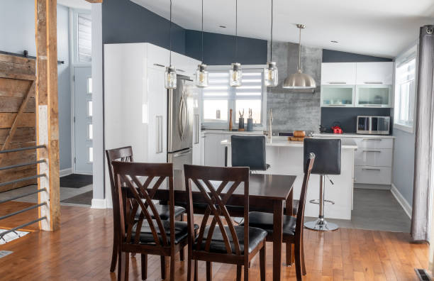 istock elegant new modern home interior dining room and kitchen 1303709742