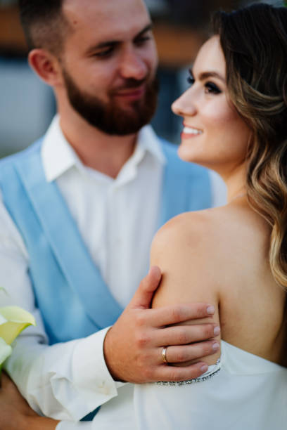 istock bride with long curls in a white elegant dress with 1303709753