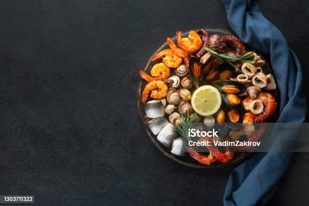Seafood Charcuterie Board With Shrimp Oysters Fish And Octopus With Copy Space Stock Photo - Download Image Now