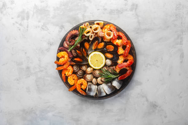istock Seafood charcuterie board with shrimp, oysters, fish and octopus 1303711333