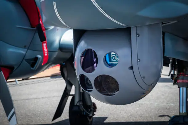 Camera sensor pod under a surveillance aircraft