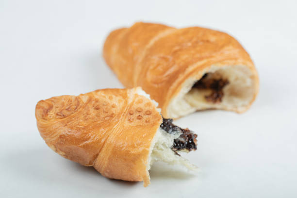istock Croissant with chocolate filling on a white background 1303716724
