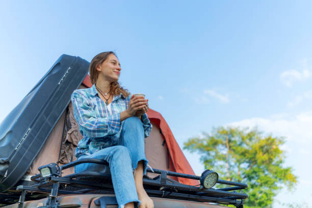istock A women travel alone with the camp car 1303722937