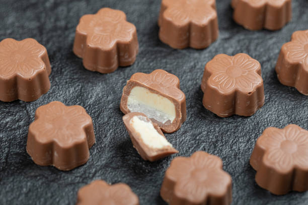 istock Some of chocolate candies on a dark background 1303726700