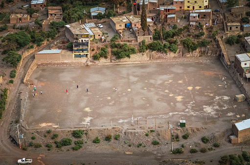 Stock photo of the football field from colored Iruya village , Salta, Argentina. Colorful landscape
