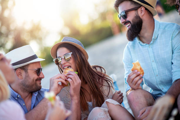 istock Friends having great time on the beach 1303732932