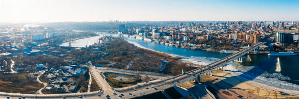 Voroshilovskiy Bridge above Don river and Rostov On Don aerial panoramic view of beautiful winter Russian city Voroshilovskiy Bridge above Don river and Rostov On Don aerial panoramic view of beautiful winter Russian city. rostov on don stock pictures, royalty-free photos & images