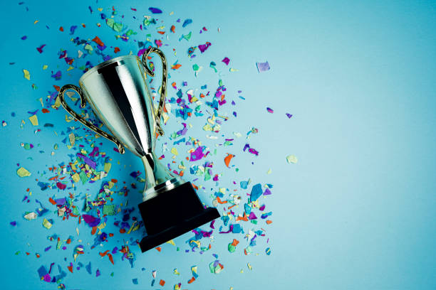 istock Golden Sports Trophy on Blue Backgrpound 1303733380