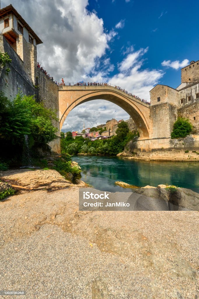 Old Bridge - a stone suspension bridge over the Neretva River in the city of Mostar in Bosnia and Herzegovina Mostar Stock Photo