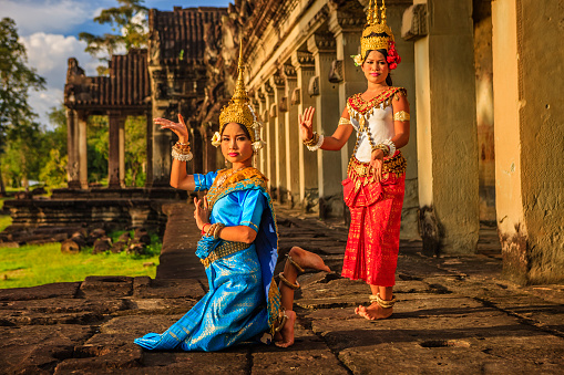 A women shows Apsara dance in old ruins near Siem Reap, Cambodia.