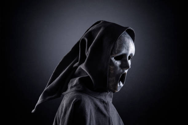 istock Ghostly figure in the darkness of the night 1303735722