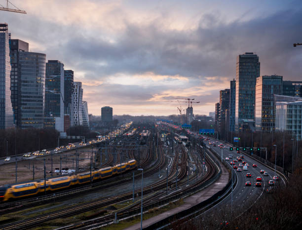 istock Freeway through the zuid-as Amsterdam business district 1303737037