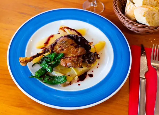 Photo of Duck confit in port with pear chutney