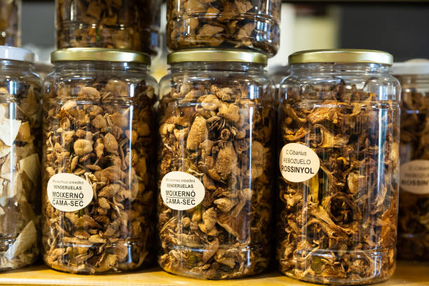istock Dried mushrooms in jars in grocery 1303737068