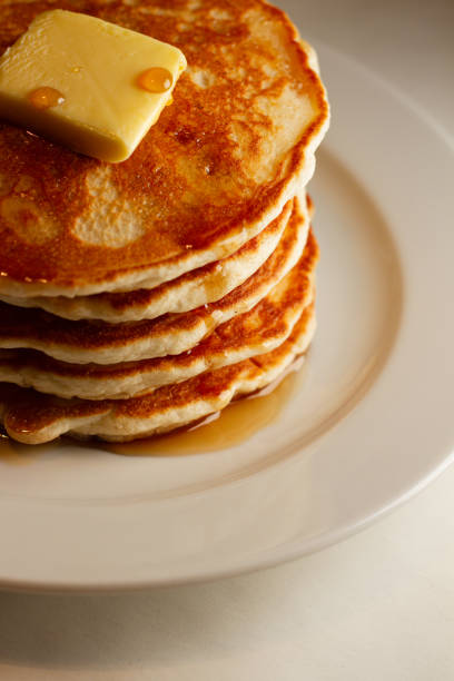 istock Tasty golden brown stack of hot cakes 1303738232