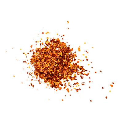 Red chilli pepper flakes with seeds isolated. Pile of broken crushed hot red pepper, dried chili flake with pink salt pieces vector illustration
