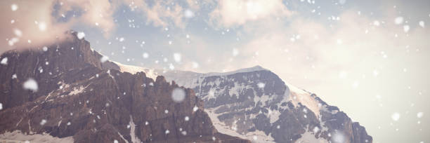 istock Snow capped mountains on a sunny day 1303743099
